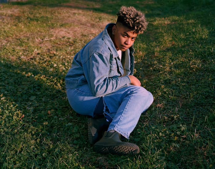 A photo of a young black man by photographer J Houston