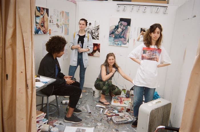 Ella Hepner and other students in an art studio