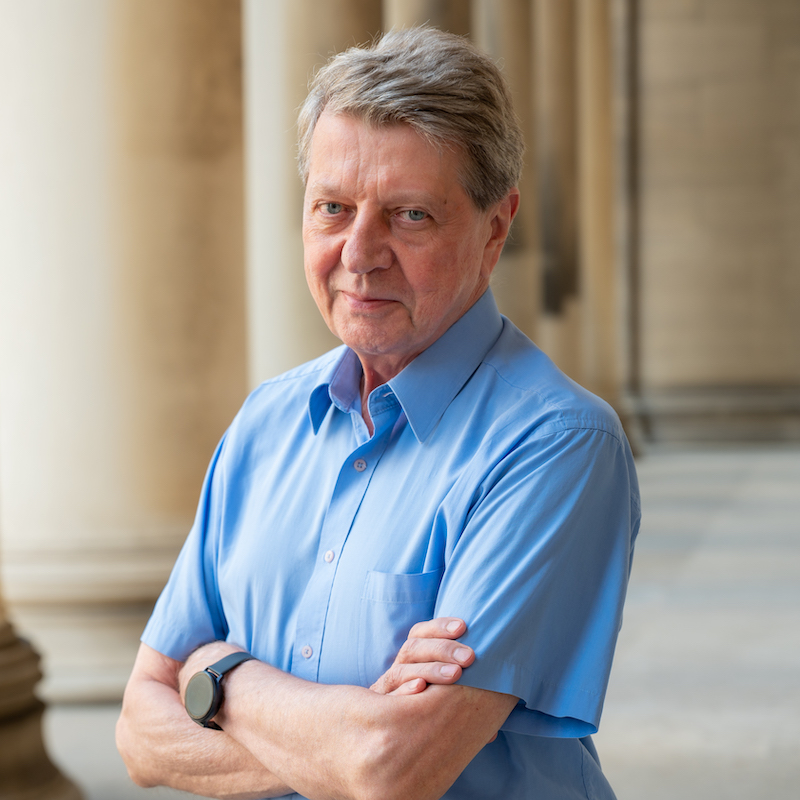 Krzysztof Matyjaszewski stands outside of Mellon Institute.