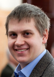 Konstantin Malanchev smiles at the camera.