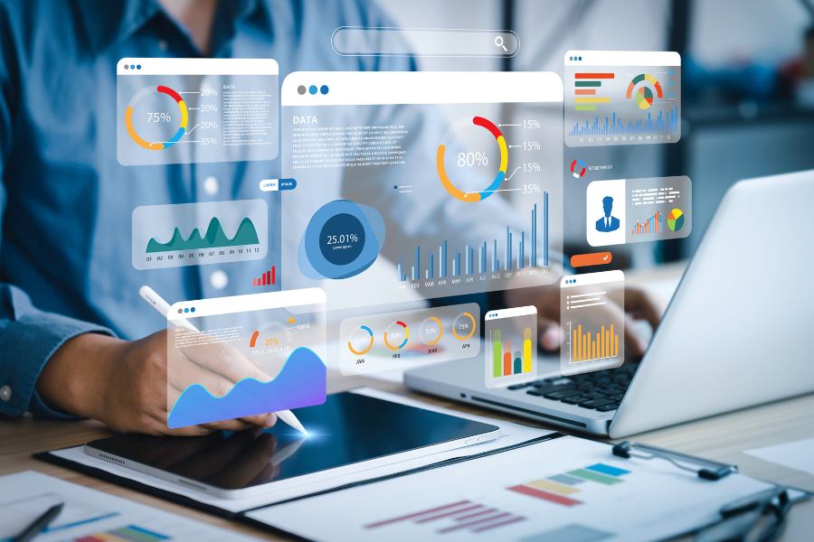 image of data charts floating above a computer screen