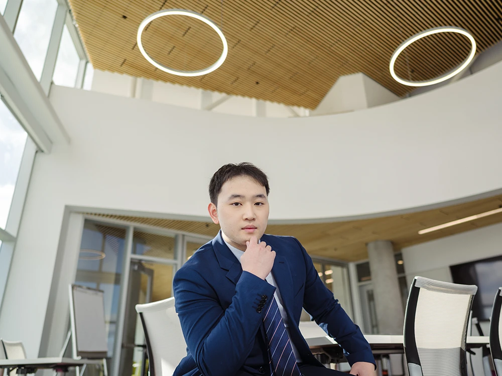 A Tepper MSM student sitting in a chair