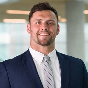 Headshot of man in business suit