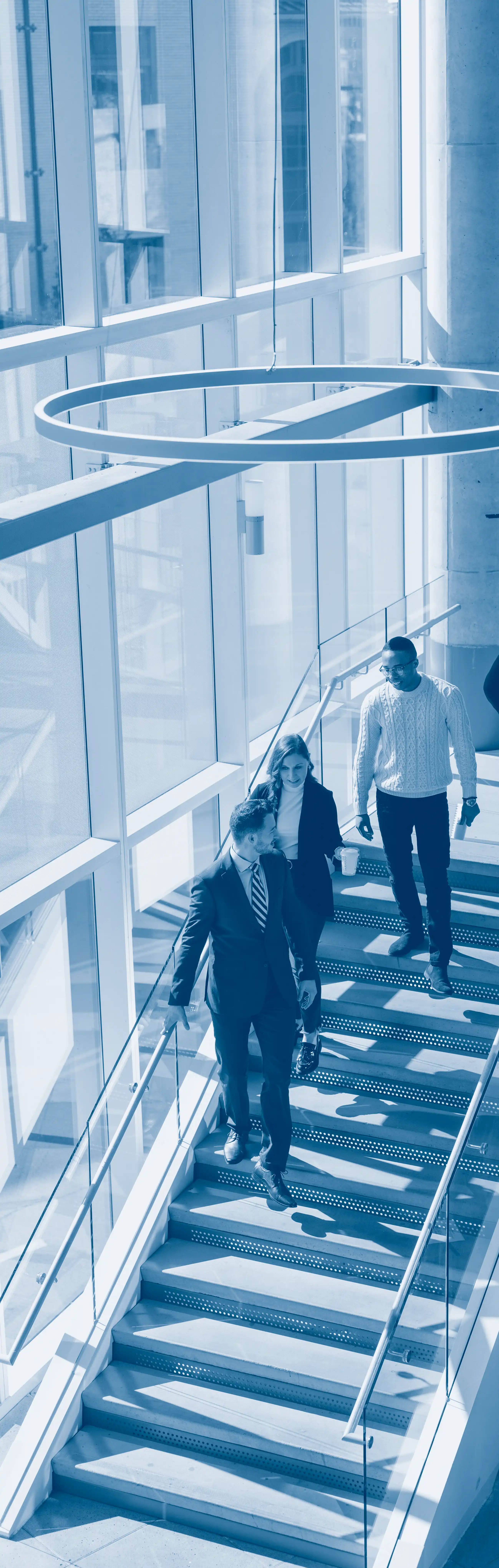 Tepper Students walking down the staircase in the Masters Commons