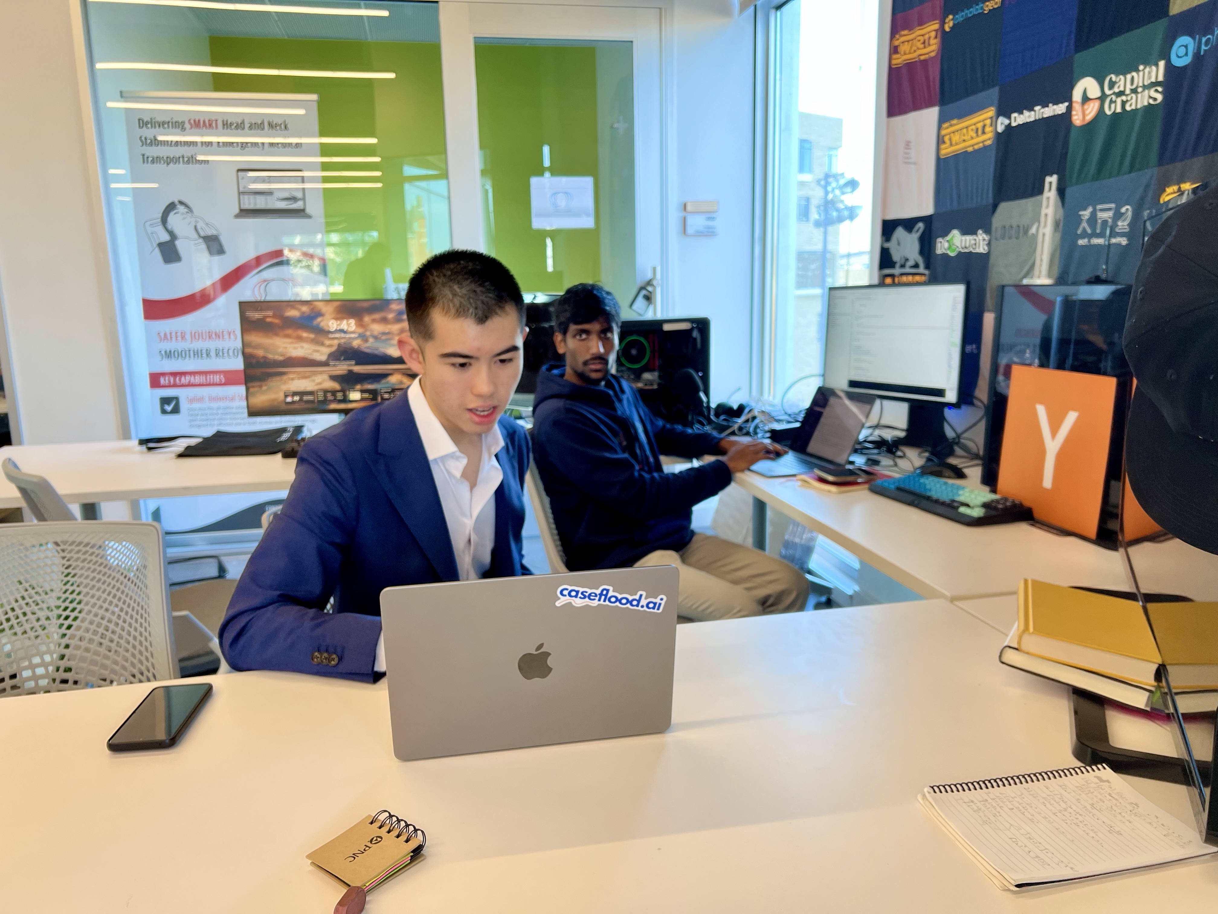 Ethan Hilton working at his desk in the Swartz Center