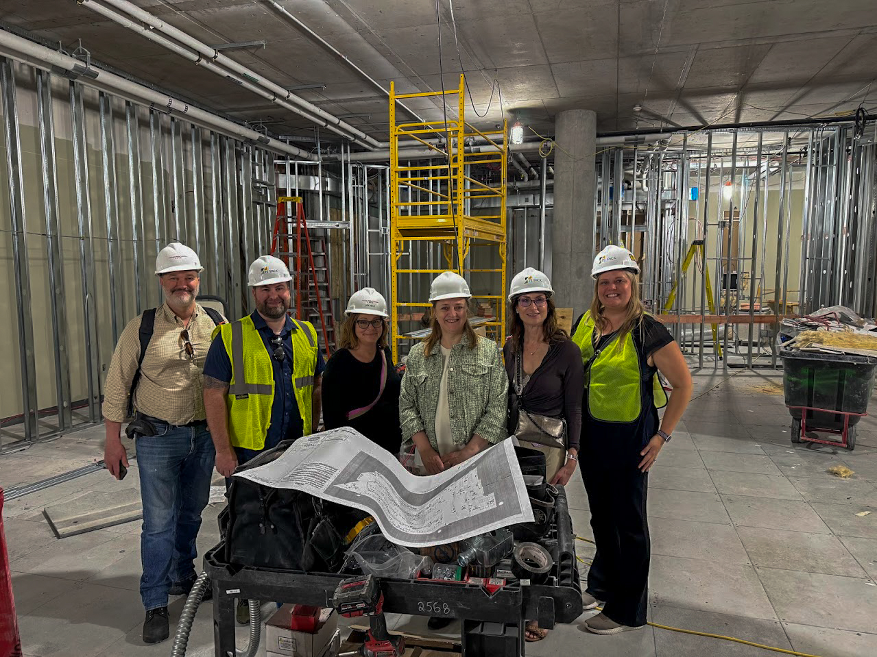 Dean Isabelle Bajeux walks through construction