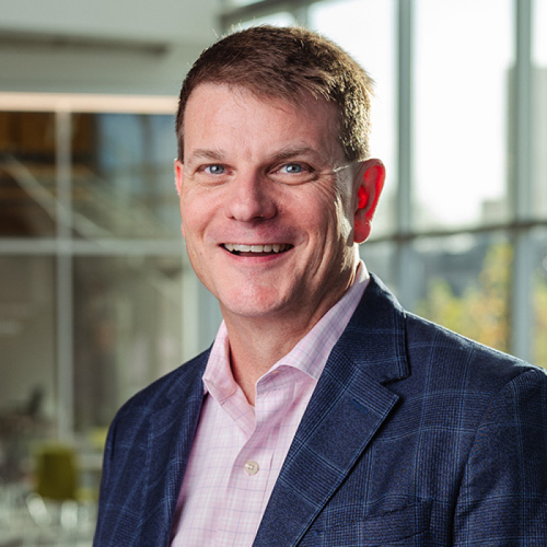 a headshot of David Betts