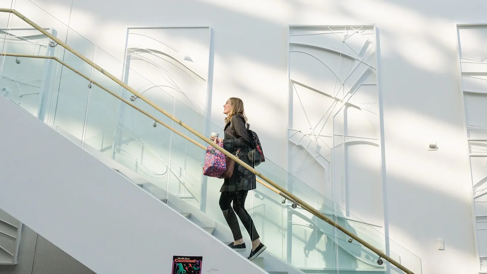 Stephanie Williams Magulick walking up the stairs
