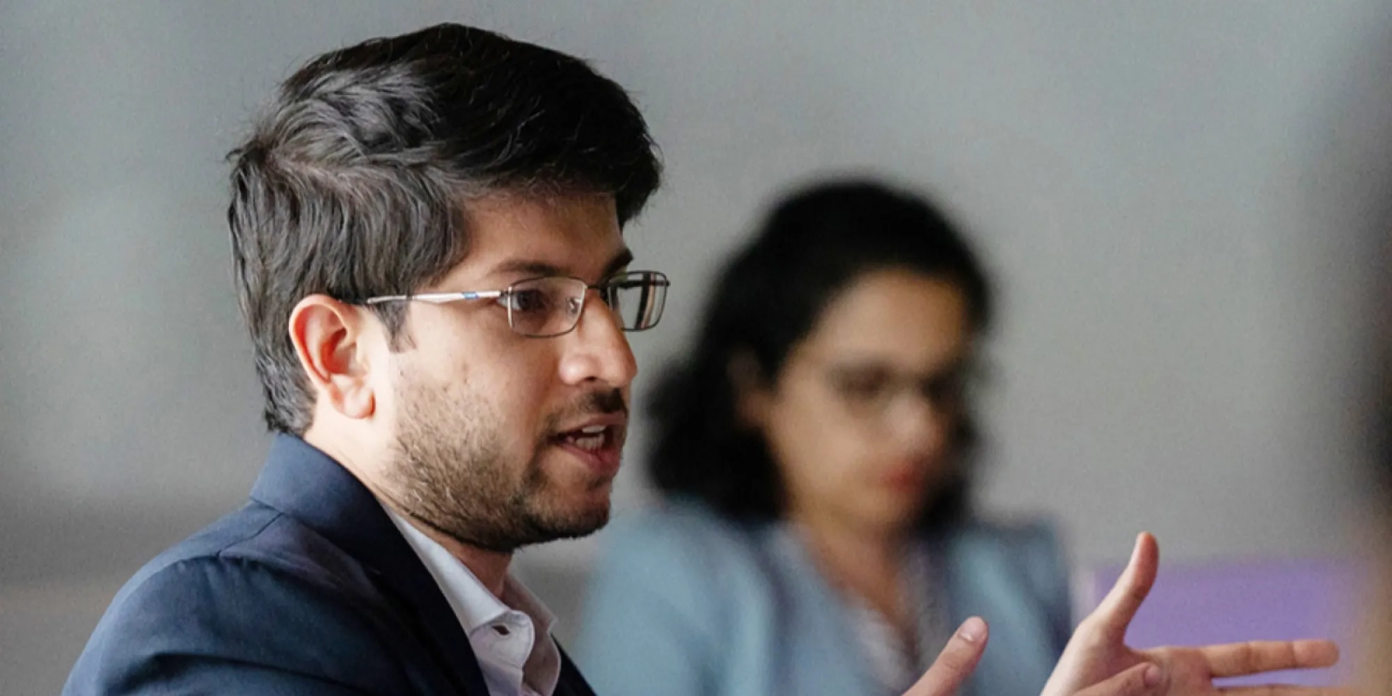 One student pointing to explain things