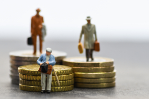 An illustration of people standing on money