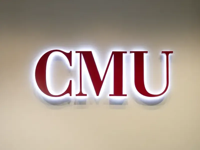 CMU lettermark with backlighting on a wall