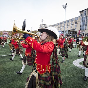 A picture of the band playing at CMU's 50th anniversary homecoming game.