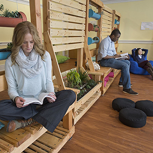 A photo of individuals in the mindfulness room