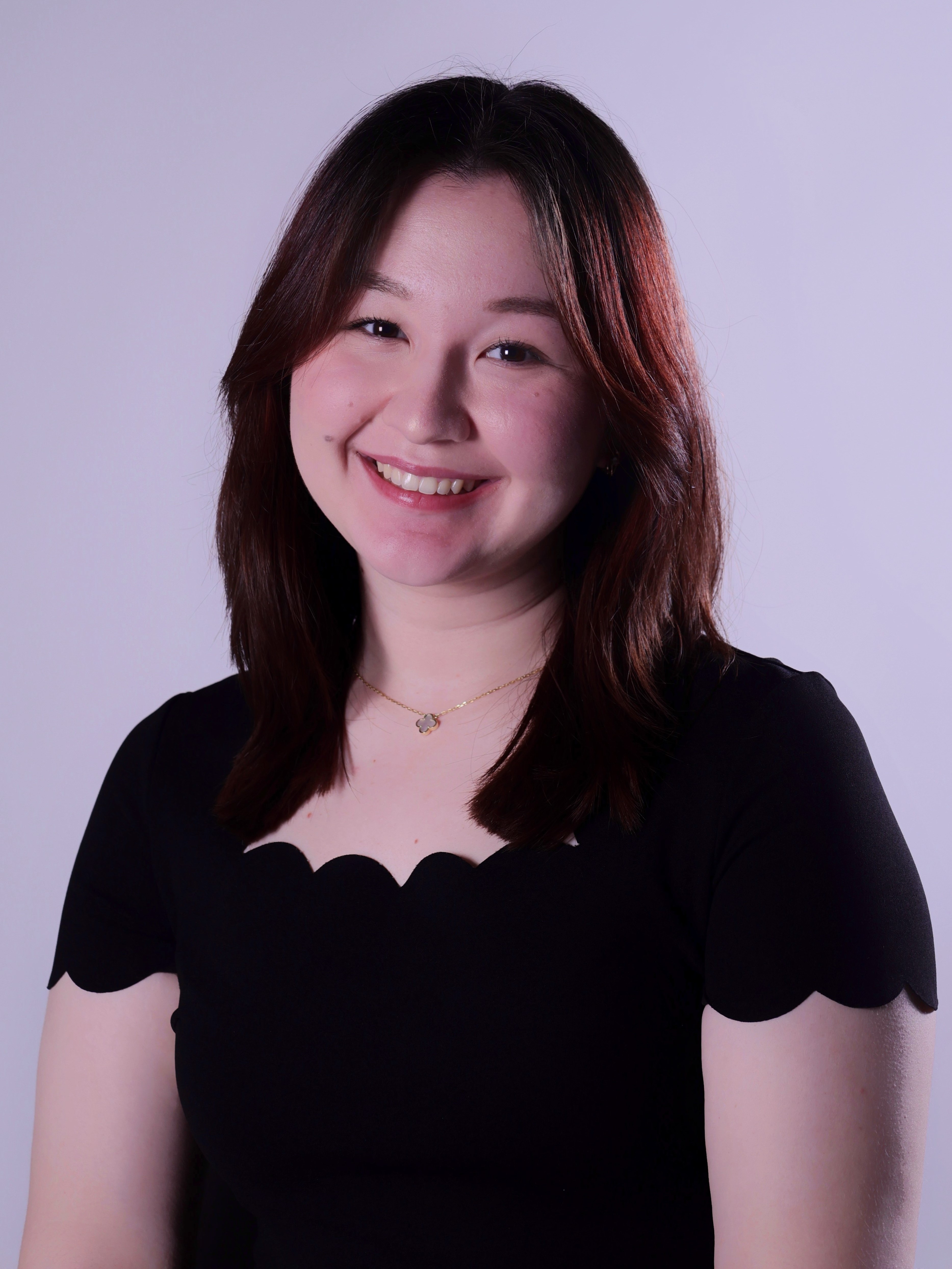 Headshot of Aziza Norkulova