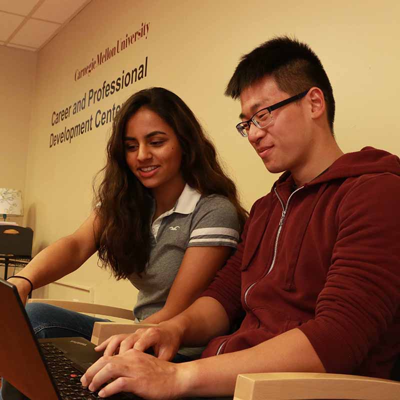 Photo of a two students in the waiting room of the Career and Professional Development Center