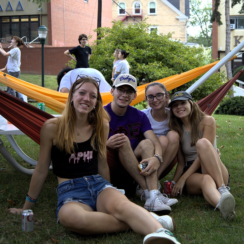 Fraternity and Sorority life members chill at a cook-out in the Greek Quad
