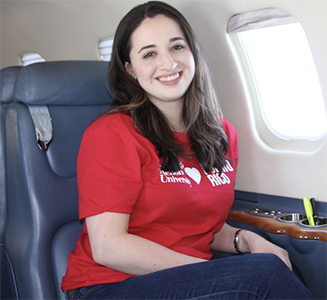 CMU Student Rosana Guernica on an airplane