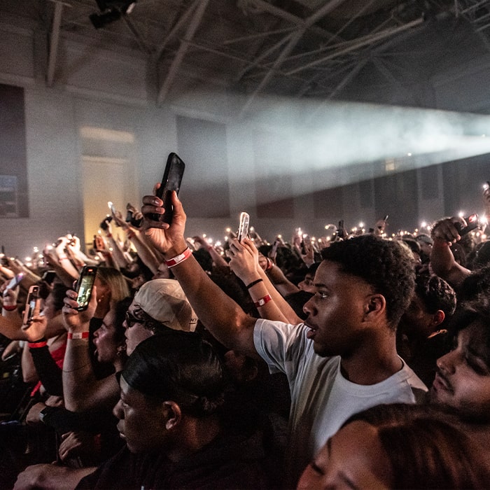 A crowd of students inside the Wiegand Gym at the 2025 Carnival Concert
