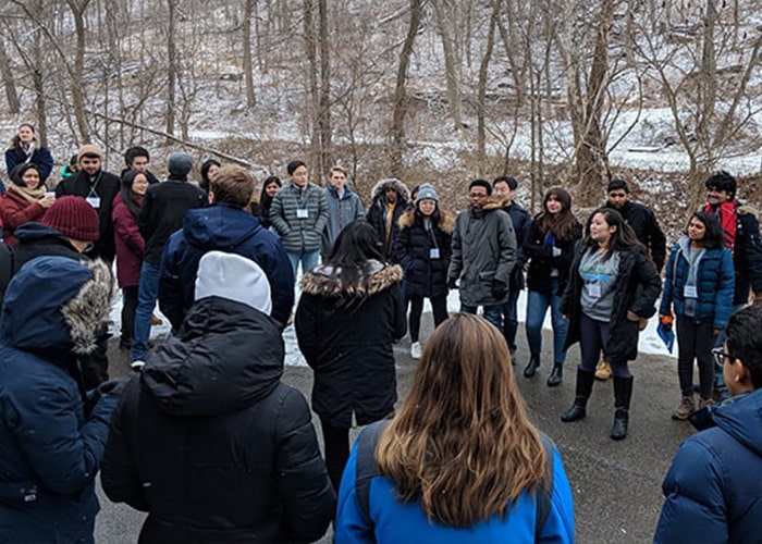Students stand around Schenley Park as part of their Emerging Leaders Program