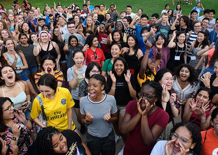 First-year students gather on the Cut to cheer in unison during Orientation week