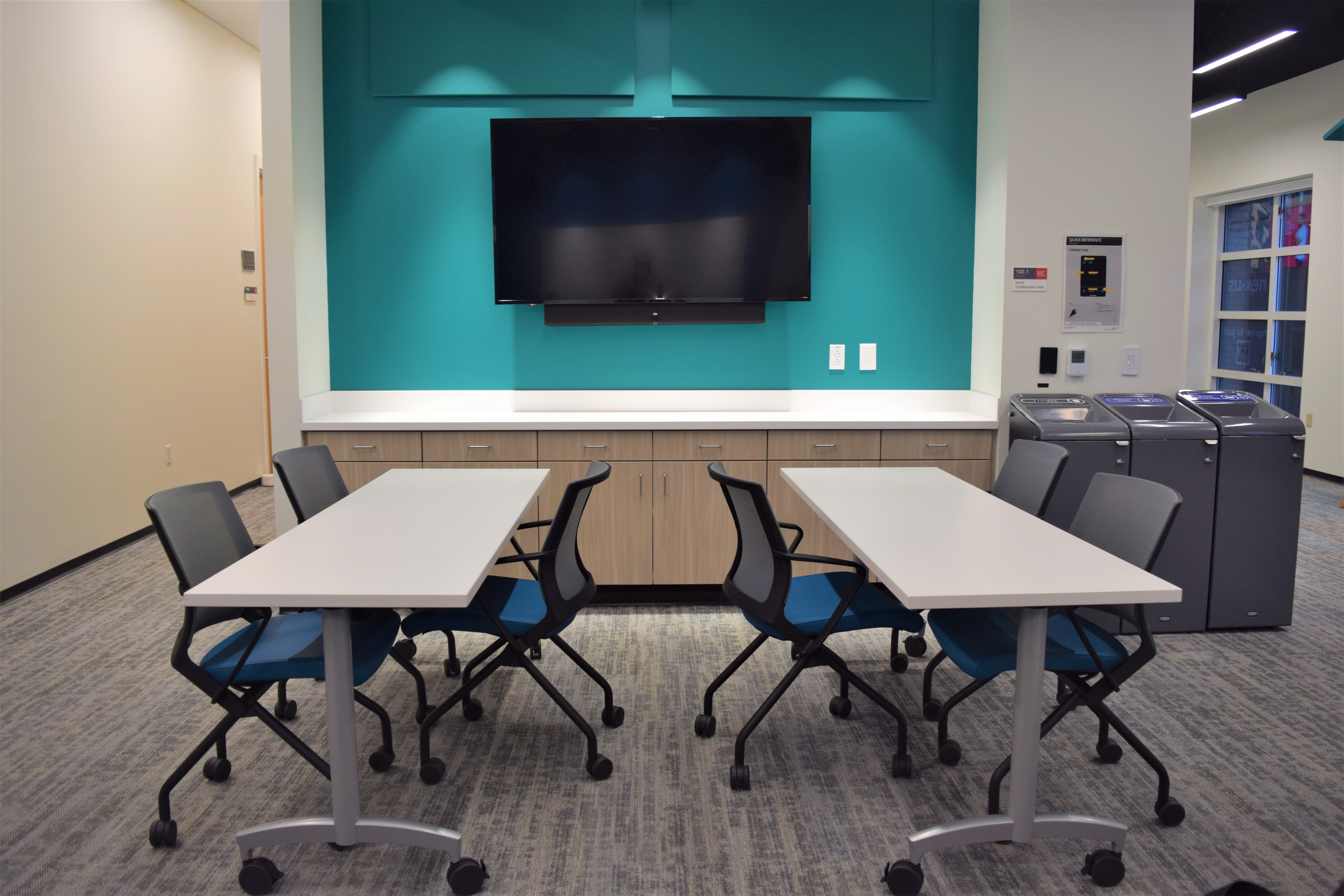 Photo of North collaboration area with 2 tables
