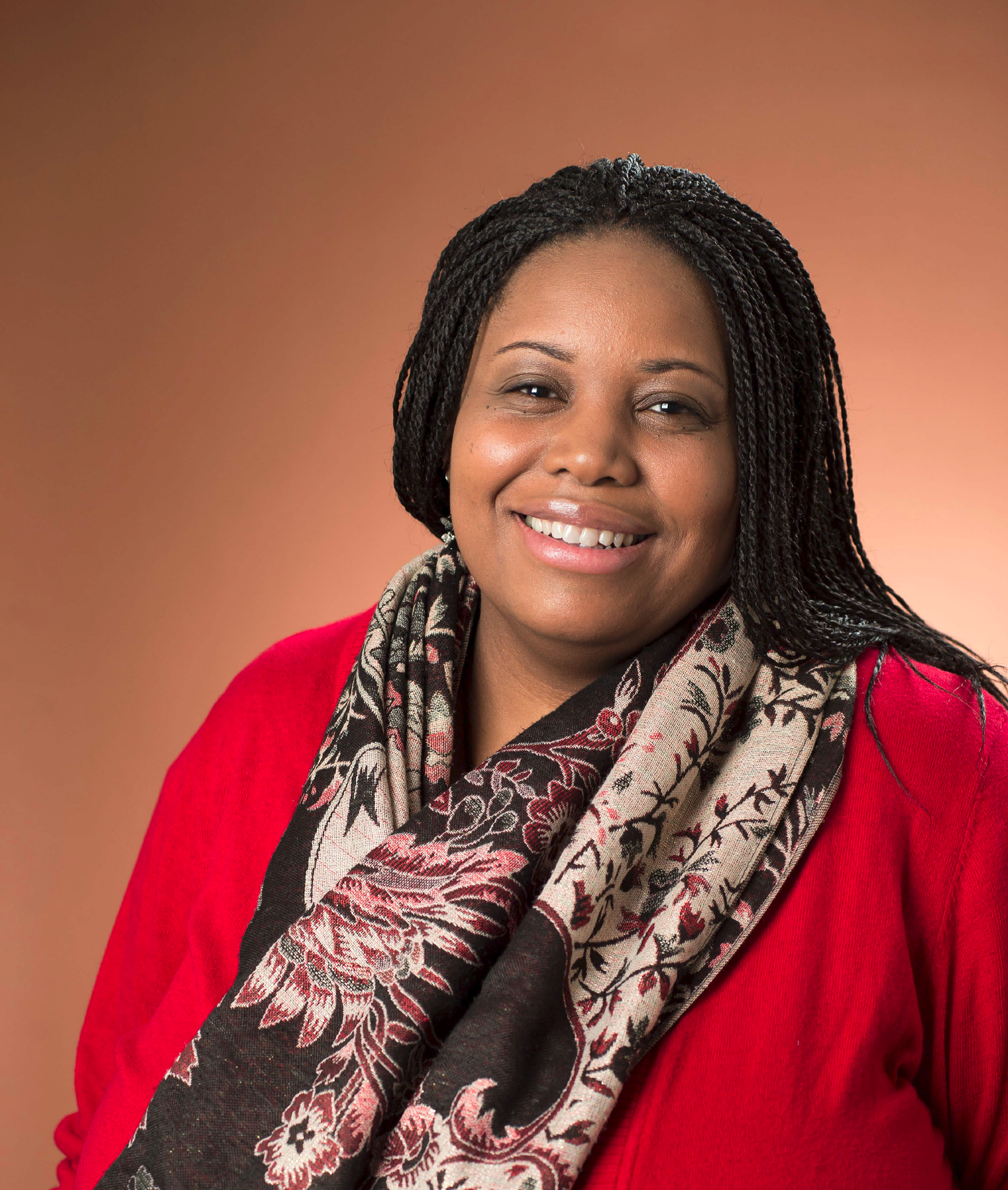 Headshot of M. Shernell Smith against a beige background