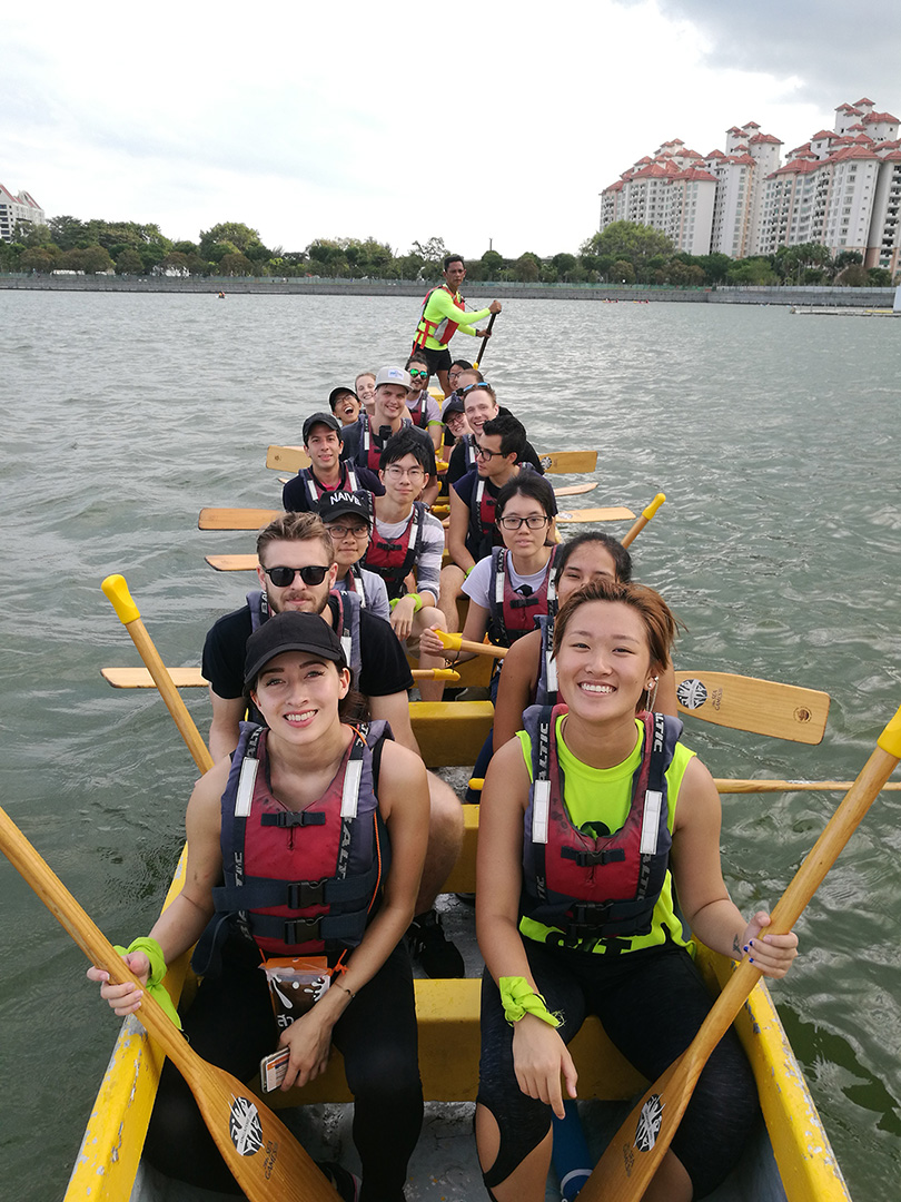Christina and friends pose in dragon boat.