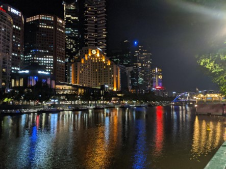 Yarra river at night, city lights reflected in the water.