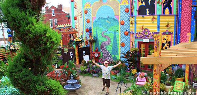 Randy Gilson poses in his garden at Randyland.