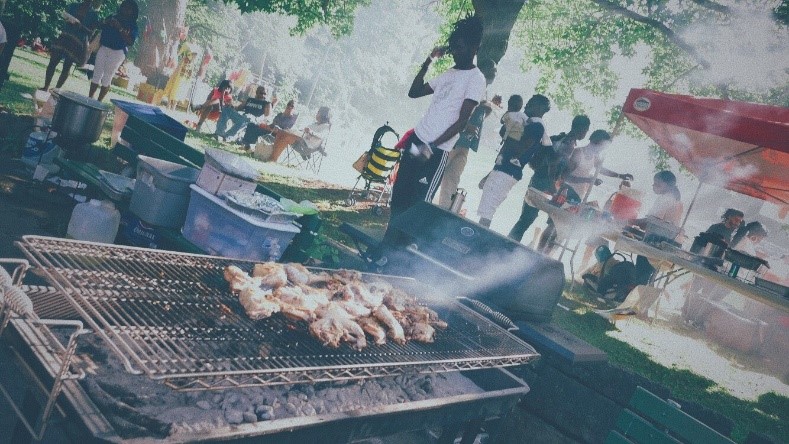jerk chicken on grill at barbecue