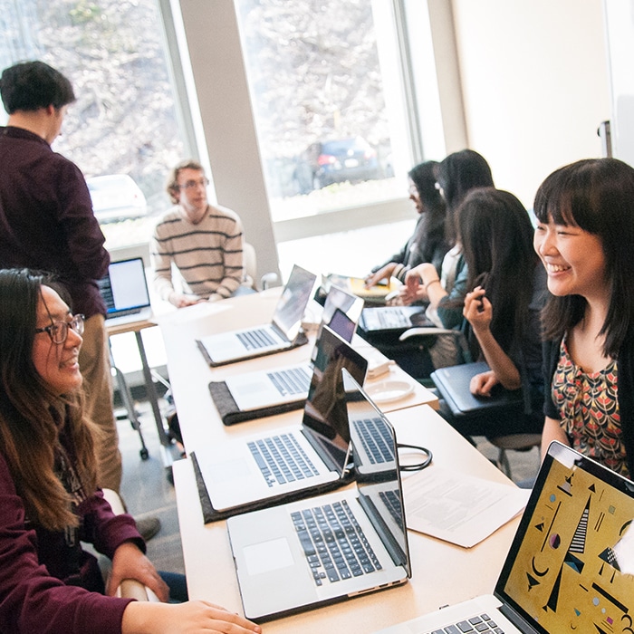 students collaborate in computer lab