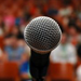 image of microphone in front of crowd