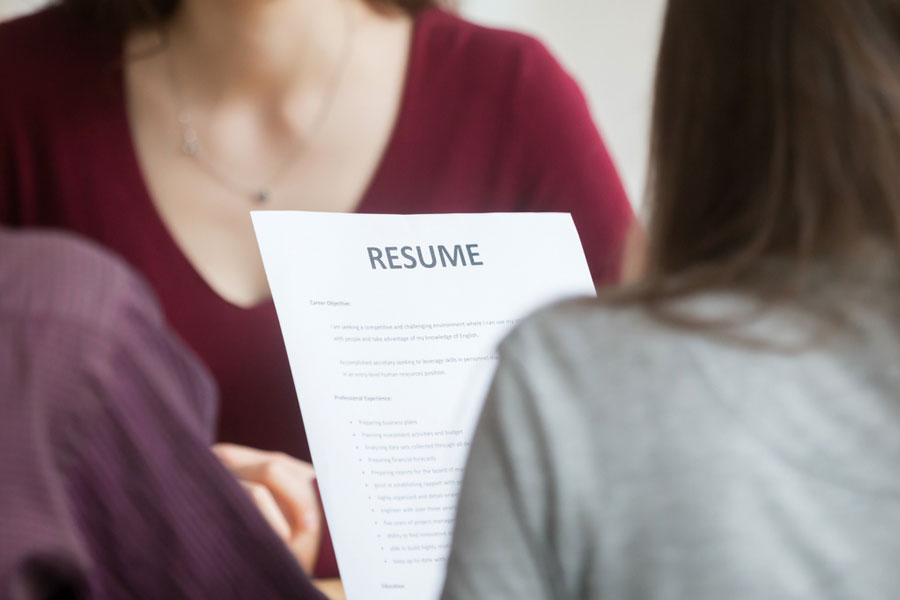 Woman reviewing a resume