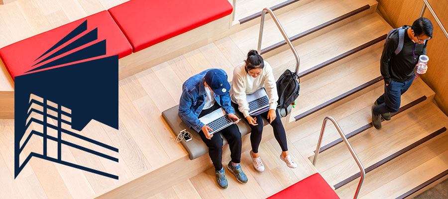 photo of students reading on laptops