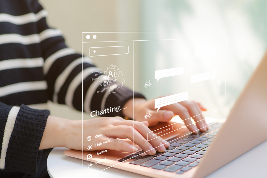 Woman using computer using AI