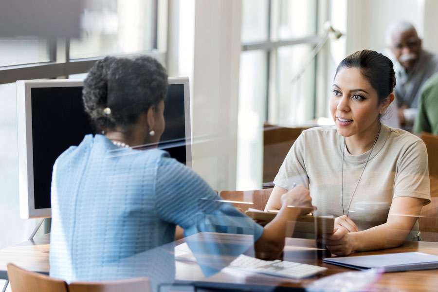 Female mentor and mentee talking