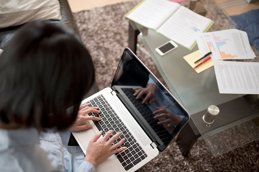 Woman working in living room