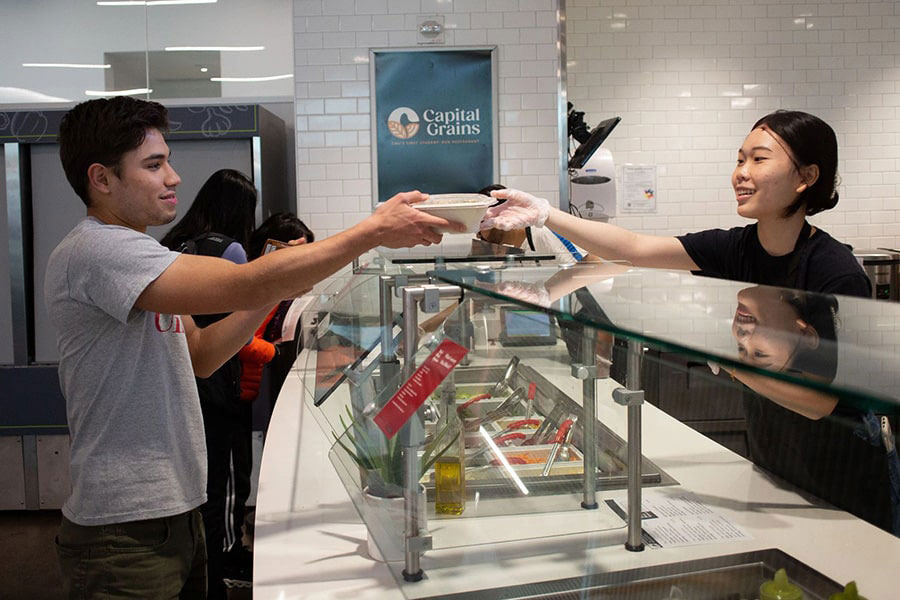 capital grains student workers serving customers