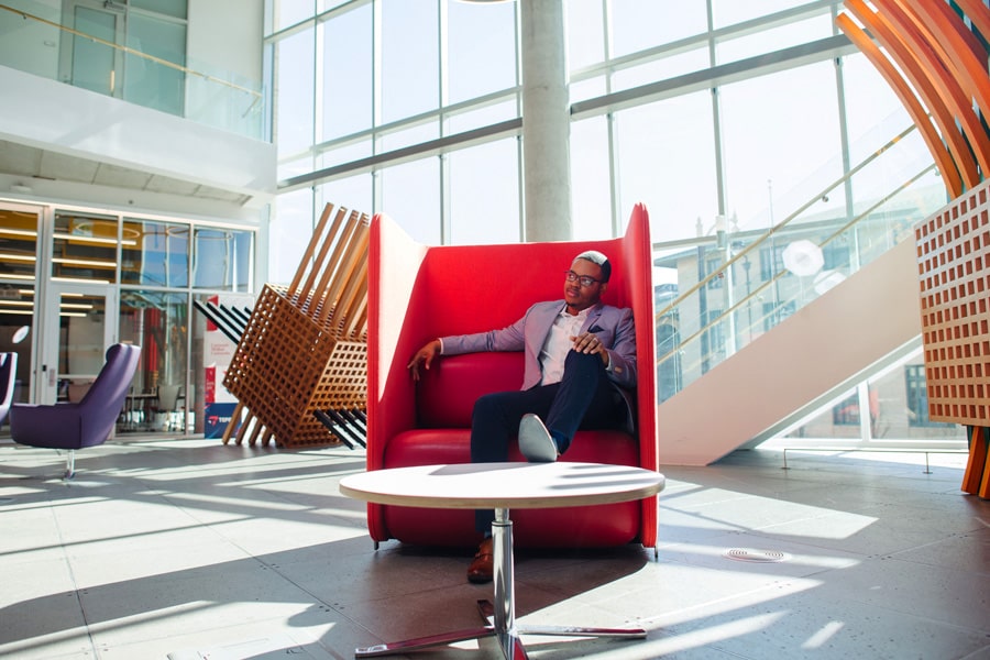 Male student on a couch