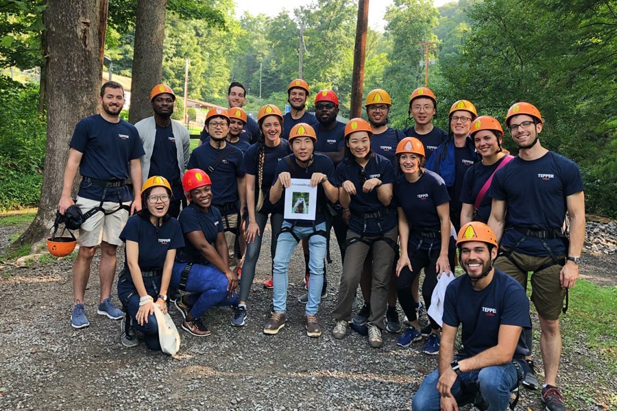 Club group at obstacle course