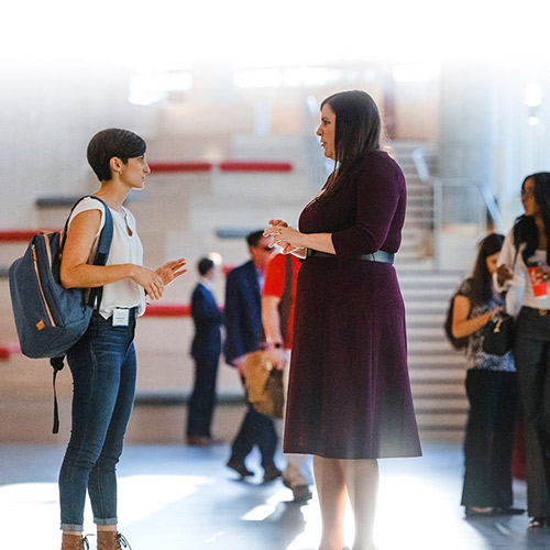 Admissions officer speaking with student