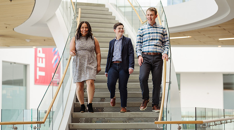 Three students walking together