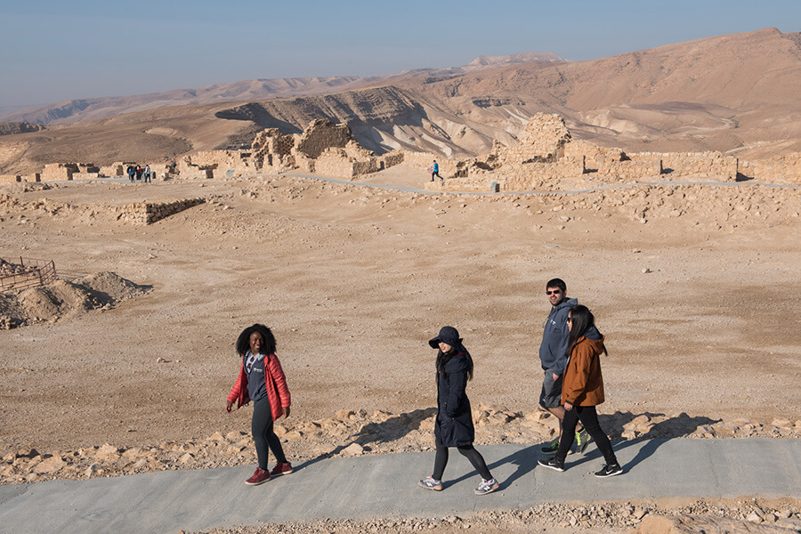 Students in Israel, walking in desert