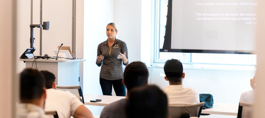 MBA Students presenting before a class