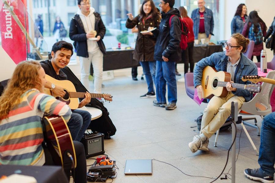 Undergrad business students at music event