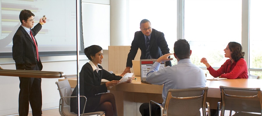 image of group working around conference table