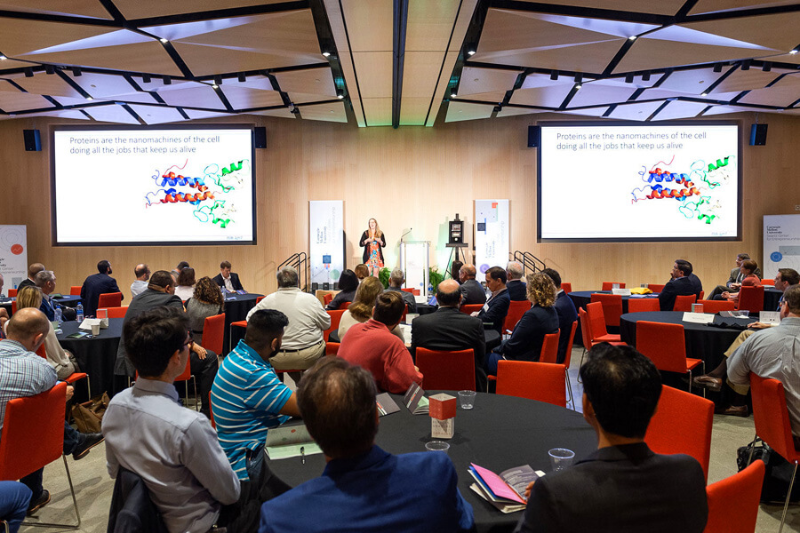 Photo of presentation in an auditorium 