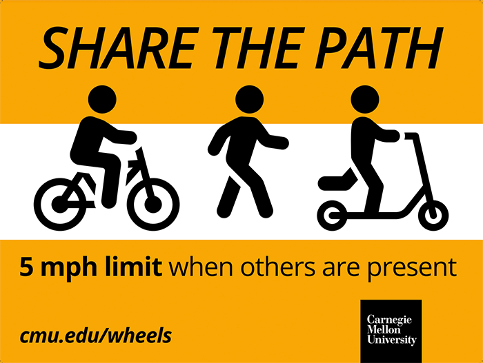 screenshot of safety sign saying riders should share the path with pedestrians and observe 5 mph limit