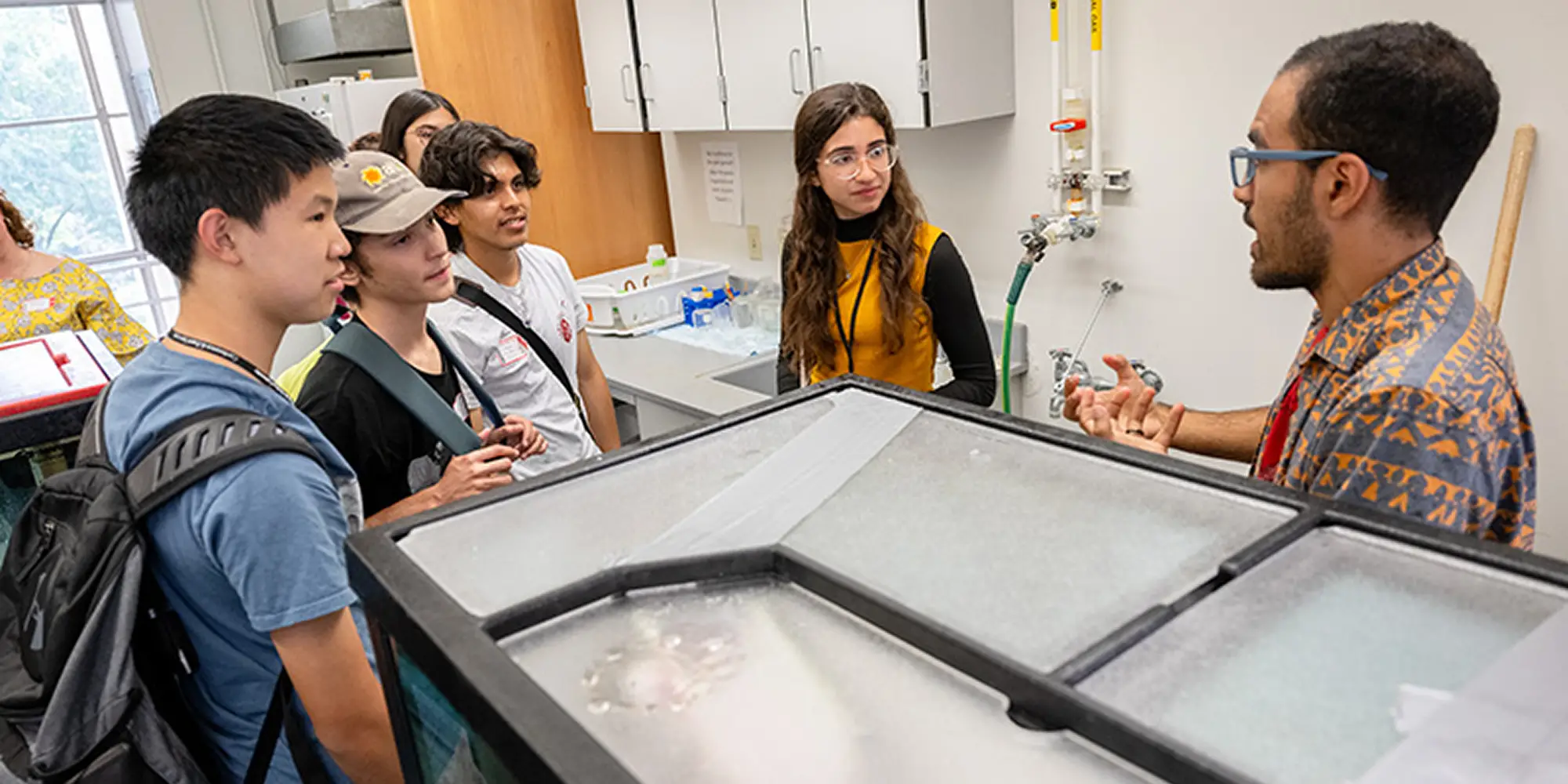 A group of prospective students on a departmental tour. 