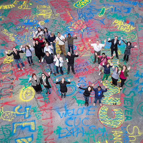 Aerial view of group with graffiti on ground